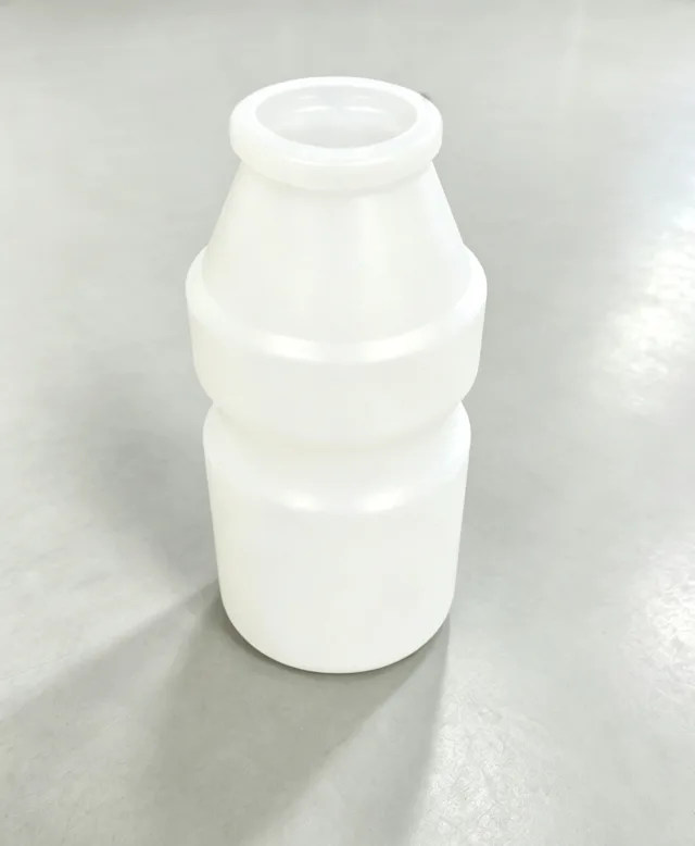 Compact Round Bottle Sample shown in supplied trial-sample imagery.