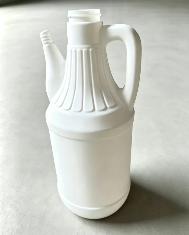 Handled Bottle with Spout shown in supplied trial-sample imagery.